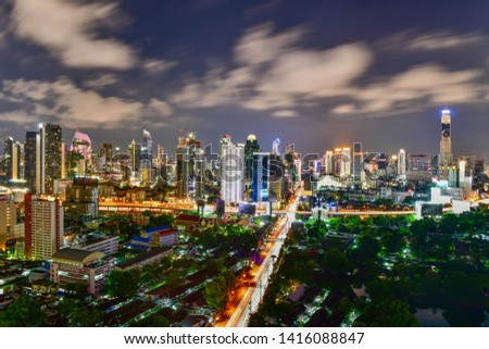 Night view cityscape commercial modern building and condominium in downtown Bangkok Thailand