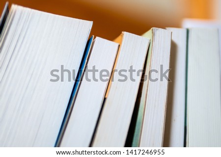 Books on bookshelf in library
