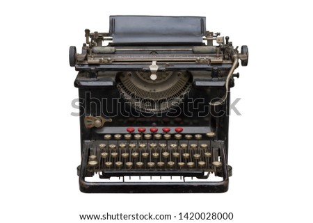 Old worn typewriter on white background