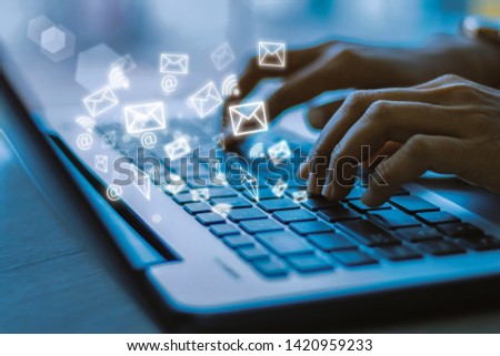 Young businesswoman hand using laptop with email icon, Email concept