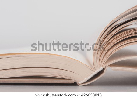 Opened book close-up education concept