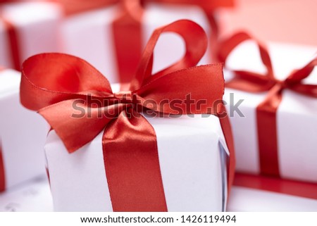 presents with red ribbons for Valentine day