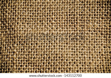 Detail and pattern of sackcloth textured background  with vignette