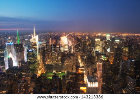 Manhattan, NYC. Spectacular sunset view of Bryant Park and Midtown from the top of Empire State Building.