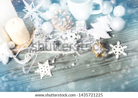 Christmas gift and decorations on wooden background
