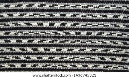patterned coarse woven fabric.  used for pedestal.