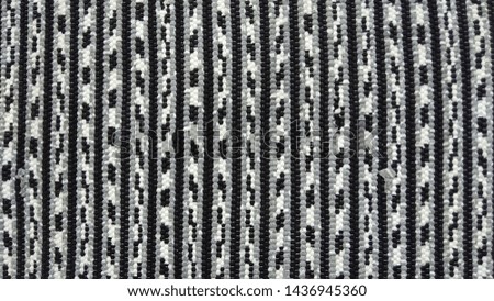 patterned coarse woven fabric.  used for pedestal.