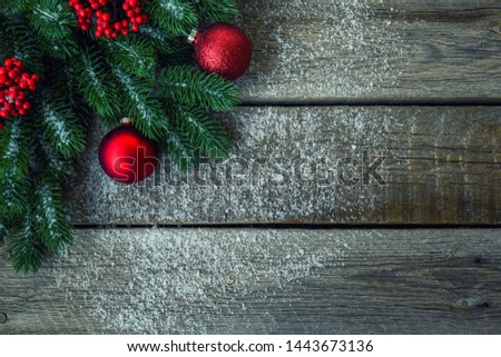 Merry Christmas and Happy Holidays! Decorated the pine tree. Holidays decorations on white snow background with copy space for your text.