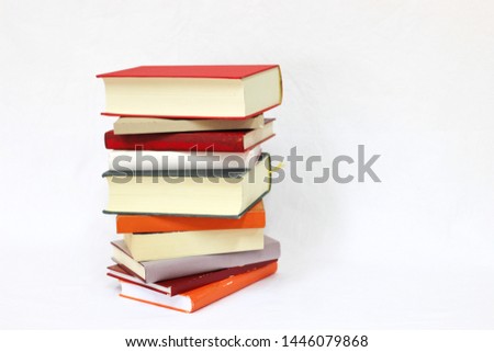 Stack of books on white bacground