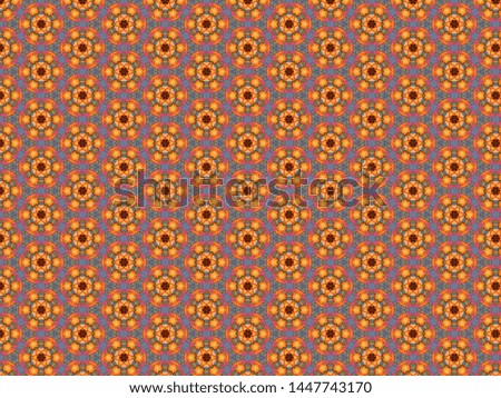 tablecloth with a pattern of berries of pink and orange color in a blue cell