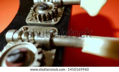   bass guitar headstock with tuning pegs . color background                              