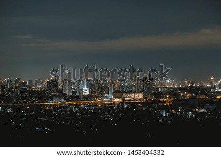 City view at night with beautiful lights with grain.