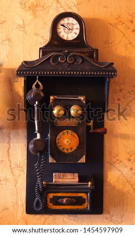                                Old vintage telephone on a wall