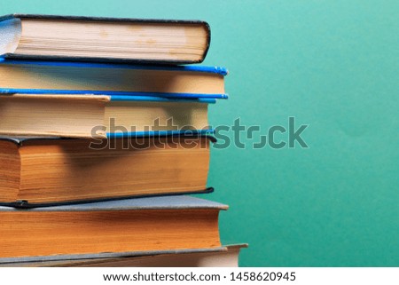  pile of old books, panorma, good copy space  on blue background - Image 