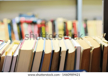 Books on shelf in library