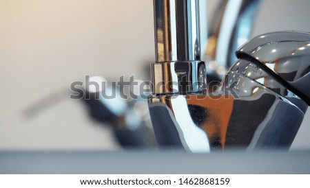 Water faucet, bathroom faucet and kitchen faucet. Chrome-plated metal.image shallow dof image