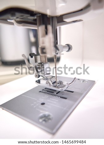 sewing machine, the main working tool. Factory.
