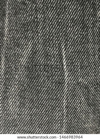 Closeup of black denim pants