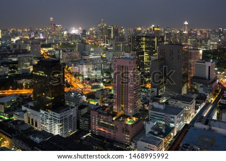 Top view of skyscrapers in central district of Bangkok in the night, Thailand