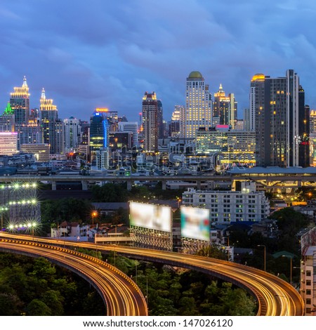 Bangkok cityscape. Traffic on the freeway in the business district. at dusk.