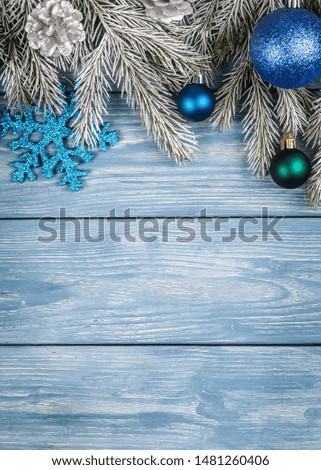 Christmas ornaments on the wooden background. Copy Space for text.