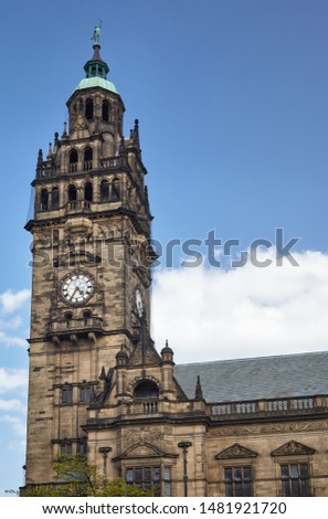 The view of the 64 metre high clock-tower of the Sheffield Town Hall which is surmounted by a statue of Vulcan. Sheffield. England  
