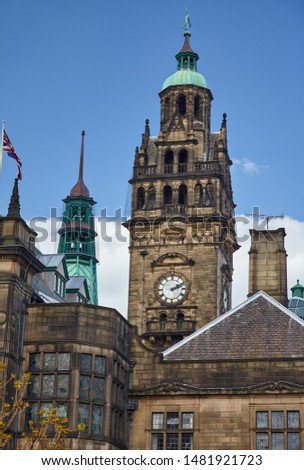 The view of the 64 metre high clock tower of the Sheffield Town Hall which is surmounted by a statue of Vulcan. Sheffield. England  