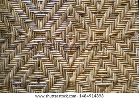 Indonesian traditional rattan weaving patterns.  This style is usually used in furniture, especially for wooden chairs.
