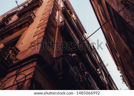 Buildings in Gothic Quarter in Barcelona Spain on hot summer day