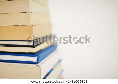 Stack of books on white