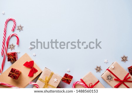 Christmas, New Year celebration, greeting, party concept. Presents wrapped in craft paper with handmade decorations, free space