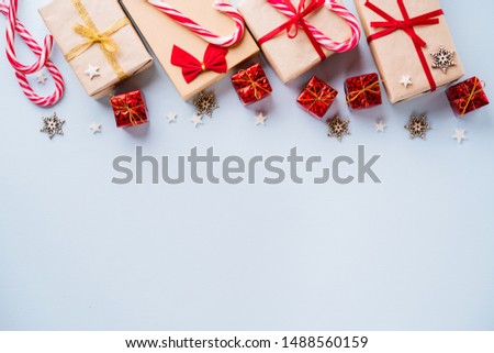 Christmas, New Year, winter holidays festivity and celebration concept. Gift boxes and decorations composition with copy space