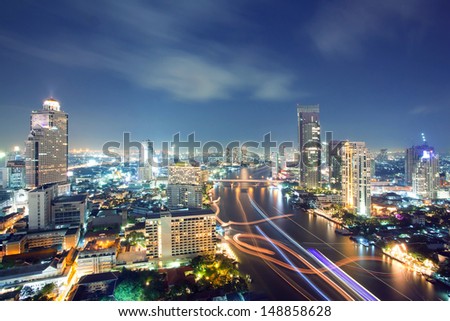 Aerial view of Bangkok Skyline along Chaophraya River at dusk
