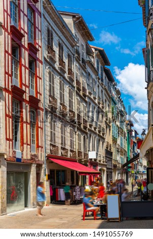 Street with historical houses in Bayonne city center. France