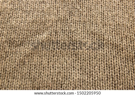 Multicolored knitted backgrounds of clothing surfaces