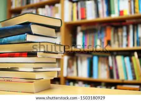 Books on the desk in the library