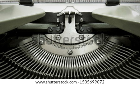 elements of a vintage mechanical typewriter. Close-up metal part