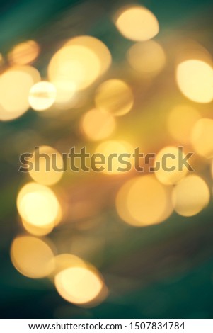 Blurred Christmas Lights On color background
