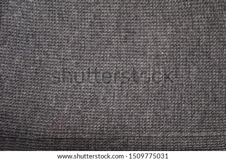 Fine synthetics fabric texture, cloth background.