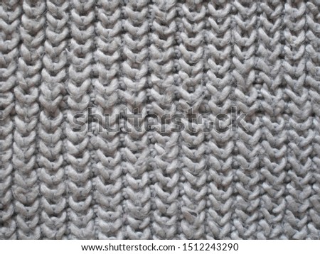 texture of an old knitted scarf