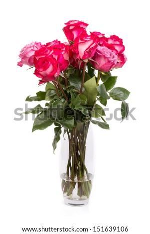 glass vase with a bouquet of roses. Isolate on white.