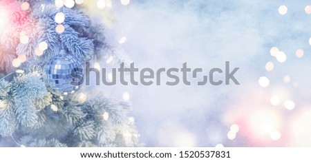 Christmas and New Year holidays background. Christmas tree with light and blurred background