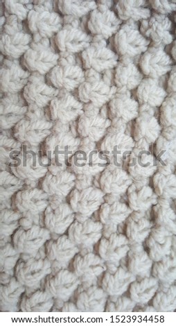 Crochet seamless pattern on a beige background 