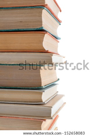 Isolated objects: old books stack on white background, close-up shot. Can be used in landscape mode too.