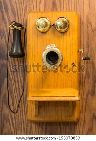 Old vintage wooden telephone