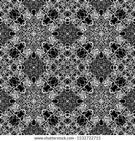 Seamless vector pattern of abstract elements. Mesh pattern.Art Nouveau pattern.Mosaic.Flat design.White graphics on a black background.For fabric design, packaging, Wallpaper and for engraving.