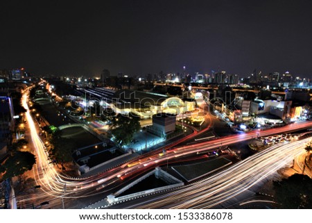 Hua Lampong railway station in Bangkok at night,amazing night light on the road,Thailand ,Deep night light in city blur background-solf selece focus