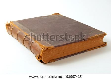 An old book close up on a light background.