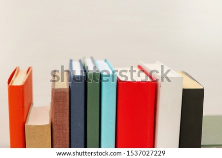 A bunch of books on the shelf