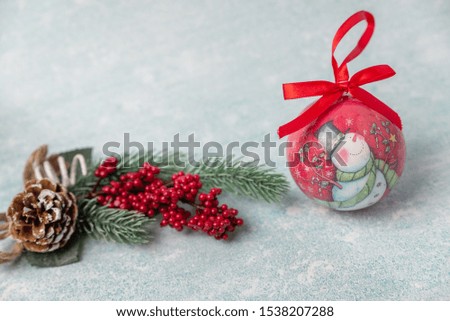 red Christmas with snowman toy on blue background with the inscription merry Christmas